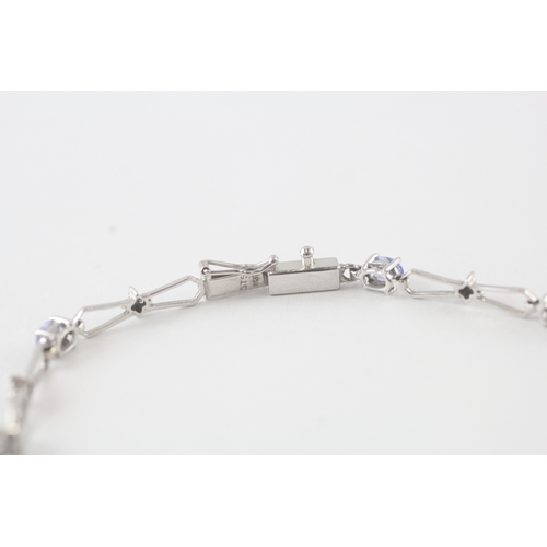 94 - 9ct gold tanzanite & diamond bracelet (3.4g)