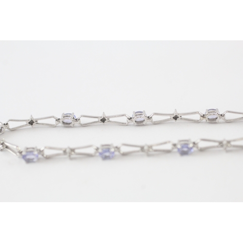 94 - 9ct gold tanzanite & diamond bracelet (3.4g)