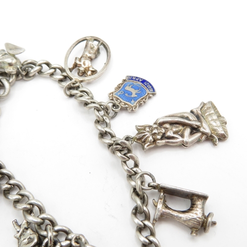 222 - 2 x Mixed Grade Silver Charm Bracelets inc Skis, Scissors and St Christopher's - 63.5g