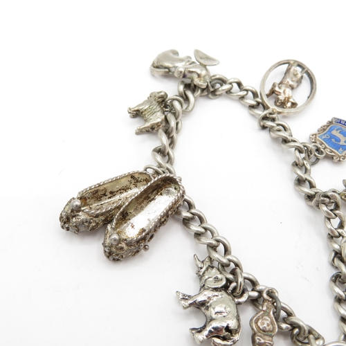 222 - 2 x Mixed Grade Silver Charm Bracelets inc Skis, Scissors and St Christopher's - 63.5g