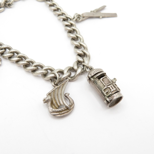 222 - 2 x Mixed Grade Silver Charm Bracelets inc Skis, Scissors and St Christopher's - 63.5g