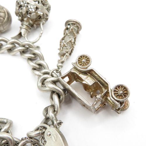 224 - Sterling Silver Charm Bracelet inc Genie Lamp and Football - 74.9g