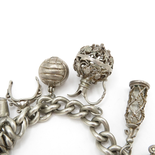 224 - Sterling Silver Charm Bracelet inc Genie Lamp and Football - 74.9g