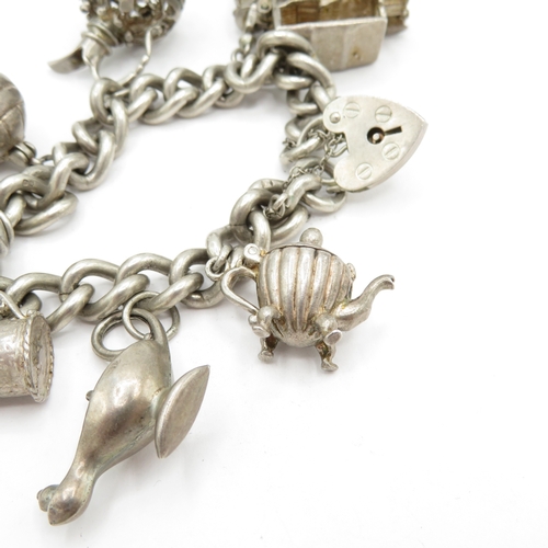 224 - Sterling Silver Charm Bracelet inc Genie Lamp and Football - 74.9g