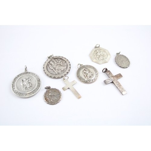 230 - Collection of Sterling Silver Georg Jensen Pendants, inc. St Christopher, Cross, Transport x 8 (61g)