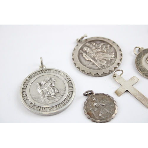 230 - Collection of Sterling Silver Georg Jensen Pendants, inc. St Christopher, Cross, Transport x 8 (61g)