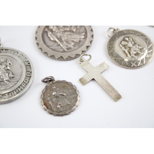 230 - Collection of Sterling Silver Georg Jensen Pendants, inc. St Christopher, Cross, Transport x 8 (61g)