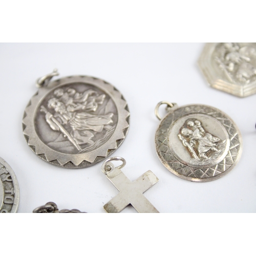 230 - Collection of Sterling Silver Georg Jensen Pendants, inc. St Christopher, Cross, Transport x 8 (61g)