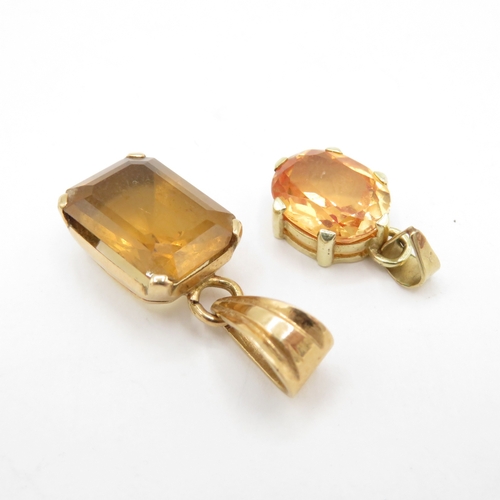 108 - Pair of 9ct Gold Pendants inc. Sapphire & Topaz  (4.4g)