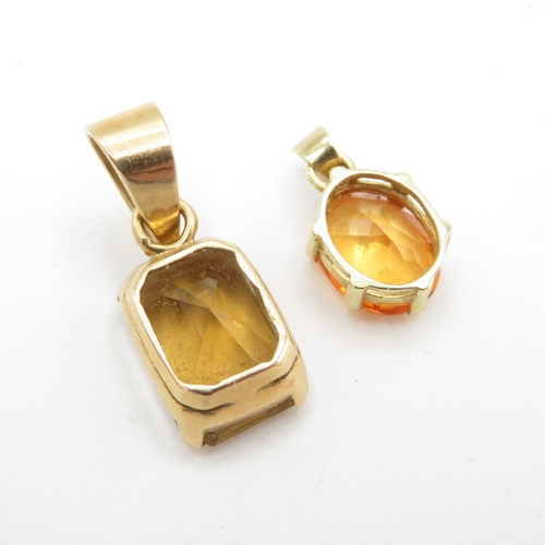 108 - Pair of 9ct Gold Pendants inc. Sapphire & Topaz  (4.4g)