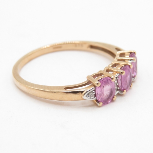 114 - 9ct Rose Gold Pink Sapphire Triology Ring, Hallmarked Birmingham  (1.7g) Size O