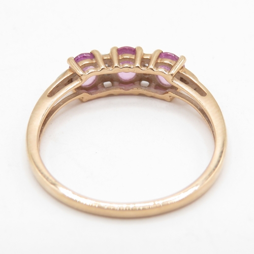 114 - 9ct Rose Gold Pink Sapphire Triology Ring, Hallmarked Birmingham  (1.7g) Size O