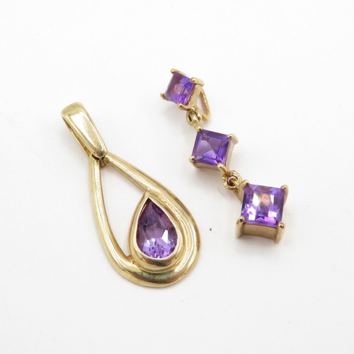 119 - Pair of 9ct Gold Amethyst Pendants (2.2g)