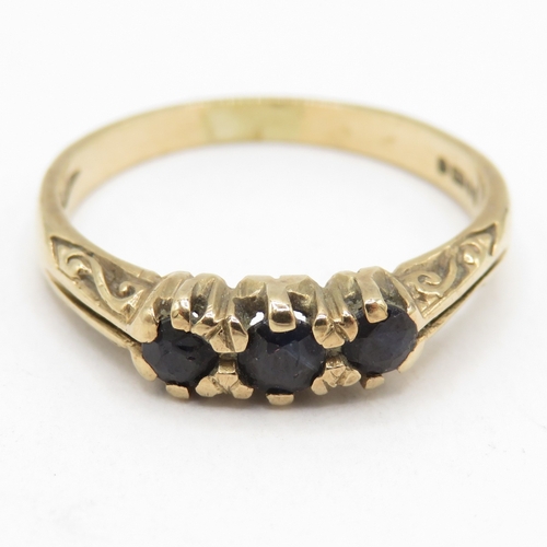 187 - 9ct gold sapphire three stone ring  (1.9g) Size L 1/2