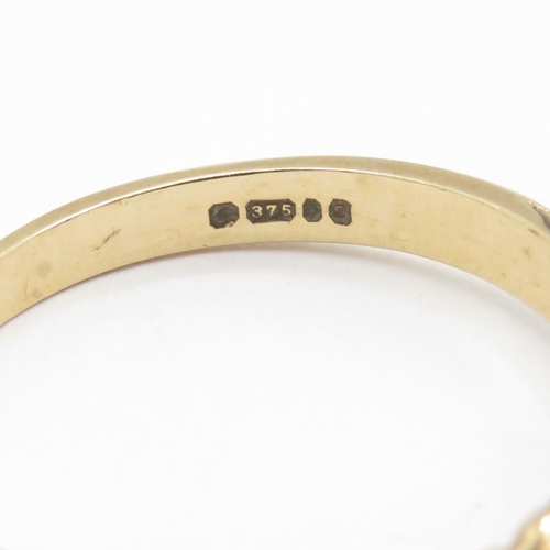 187 - 9ct gold sapphire three stone ring  (1.9g) Size L 1/2