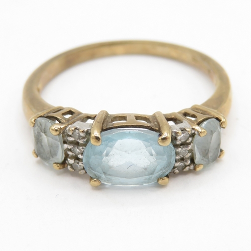 195 - 9ct gold topaz and diamond dress ring  (2.8g) Size O 1/2