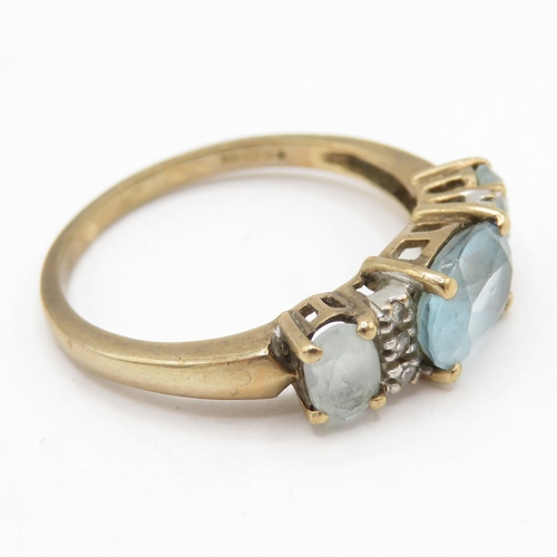 195 - 9ct gold topaz and diamond dress ring  (2.8g) Size O 1/2