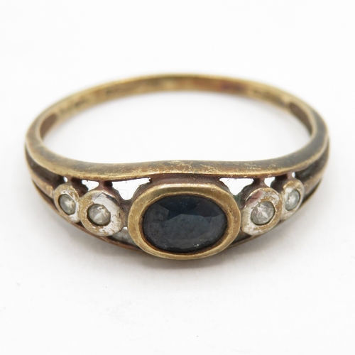 196 - 9ct gold sapphire and white gemstone  (1.7g) Size P 1/2
