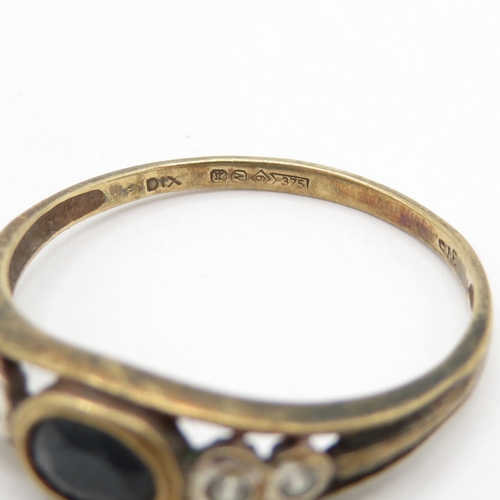 196 - 9ct gold sapphire and white gemstone  (1.7g) Size P 1/2