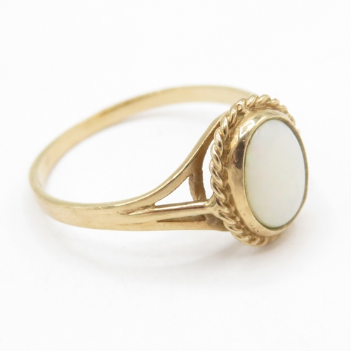 198 - 9ct gold hallmarked Birmingham opal solitaire ring  (1.4g) Size M