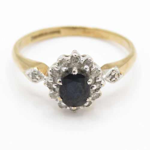 73 - 9ct gold diamond and sapphire cluster ring (1.9g) Size N