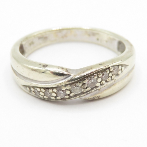 75 - 9ct gold diamond cross-over ring (2.6g) Size L