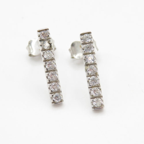 77 - 9ct white gold diamond stud earrings (1.3g)