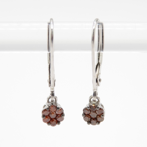 92 - 9ct gold enhanced red diamond drop earrings (1g)