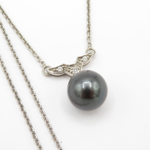 93 - 9ct gold cultured pearl & diamond necklace (3.7g)