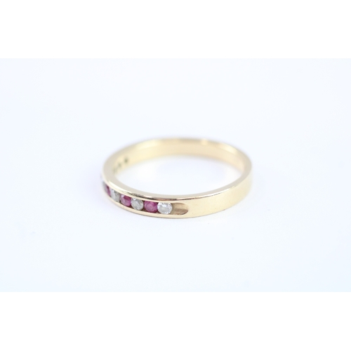 23 - 14ct gold ruby &diamond half eternity ring (2.3g) Size N