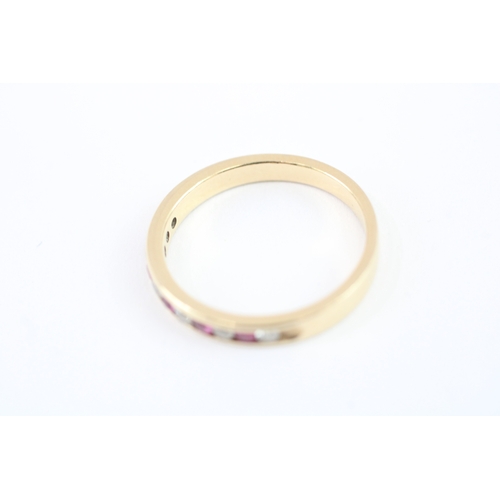 23 - 14ct gold ruby &diamond half eternity ring (2.3g) Size N