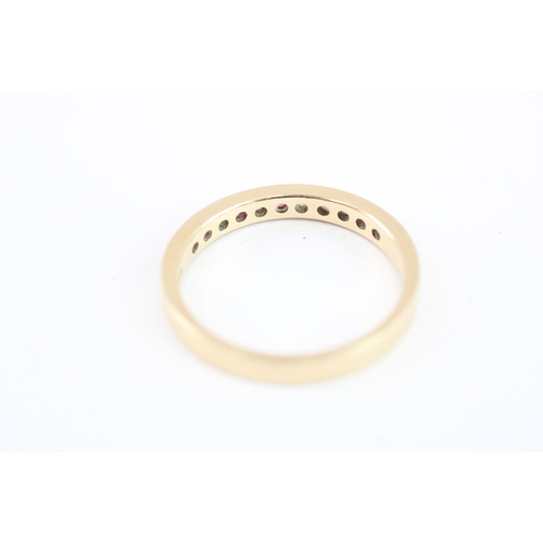 23 - 14ct gold ruby &diamond half eternity ring (2.3g) Size N