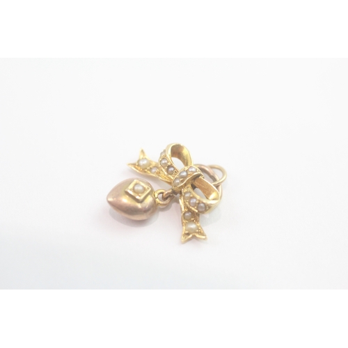 64 - Antique 9ct gold split pearl set pendant (1.4g)