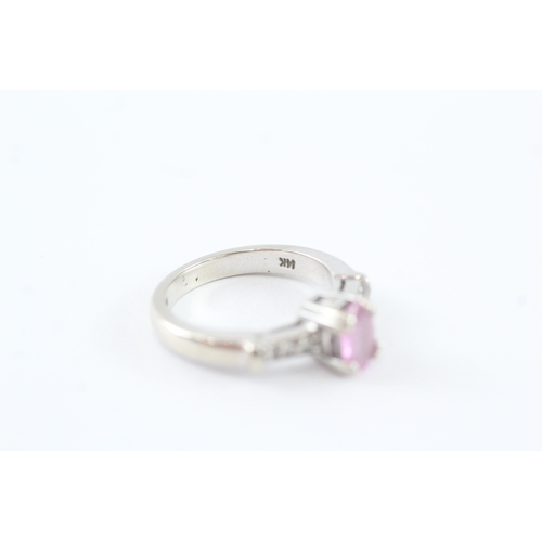 65 - 14ct white gold diamond and pink sapphire dress ring (4.9g) Size L 1/2