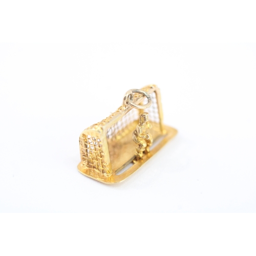 67 - 9ct gold vintage goalkeeper charm (1.9g)