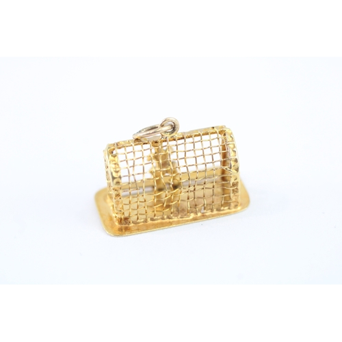 67 - 9ct gold vintage goalkeeper charm (1.9g)