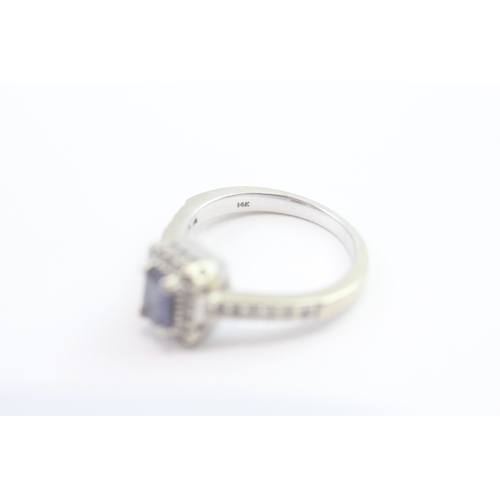 69 - 14ct white gold diamond and tanzanite dress ring (5.2g) Size N