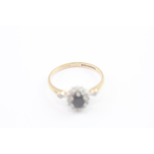 73 - 9ct gold diamond and sapphire cluster ring (1.9g) Size N