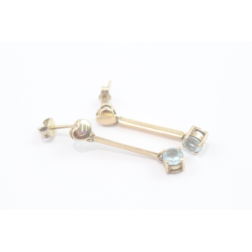 74 - 9ct gold blue topaz drop earrings (2g)