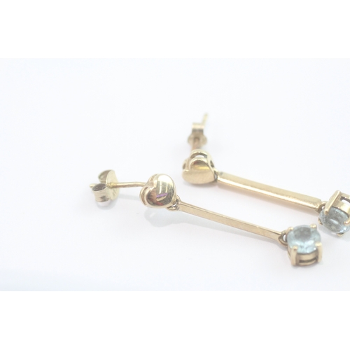 74 - 9ct gold blue topaz drop earrings (2g)