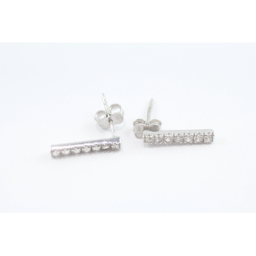 77 - 9ct white gold diamond stud earrings (1.3g)