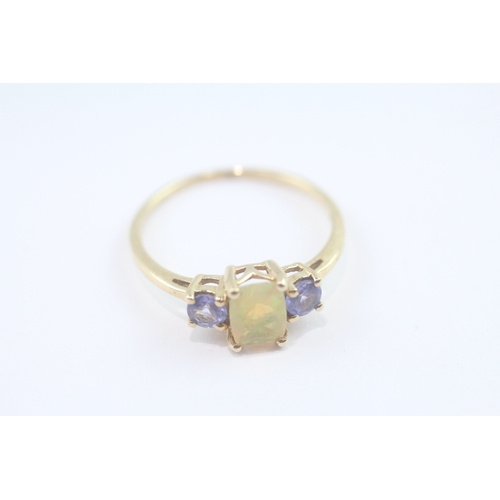 79 - 9ct gold opal & tanzanite trilogy ring (1.7g) Size P