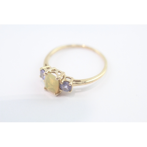79 - 9ct gold opal & tanzanite trilogy ring (1.7g) Size P