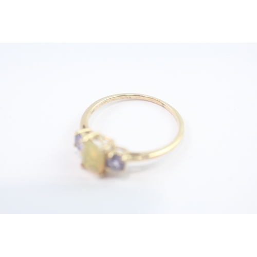 79 - 9ct gold opal & tanzanite trilogy ring (1.7g) Size P