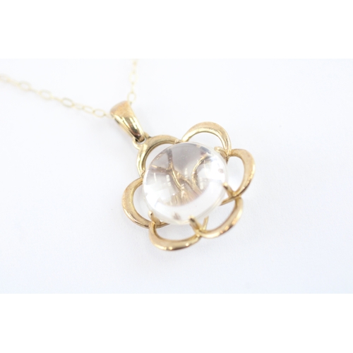 81 - 9ct gold cabochon cut rock crystal pendant necklace (2.4g)