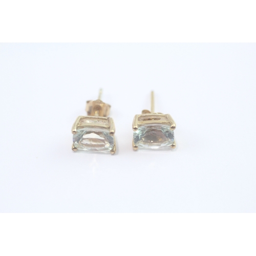 83 - 9ct gold prasiolite stud earrings (1.3g)