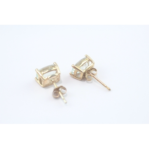 83 - 9ct gold prasiolite stud earrings (1.3g)