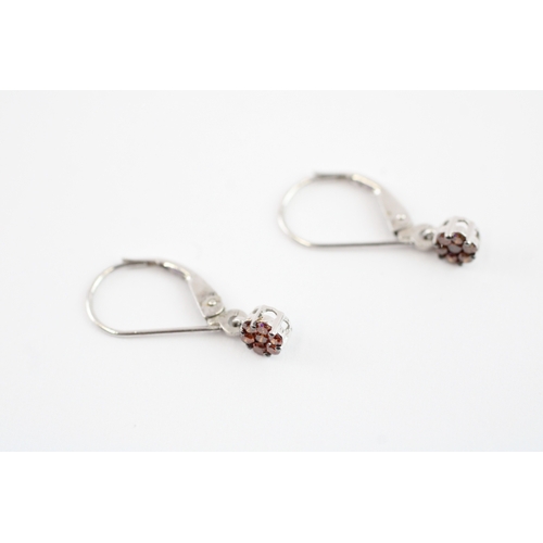 92 - 9ct gold enhanced red diamond drop earrings (1g)