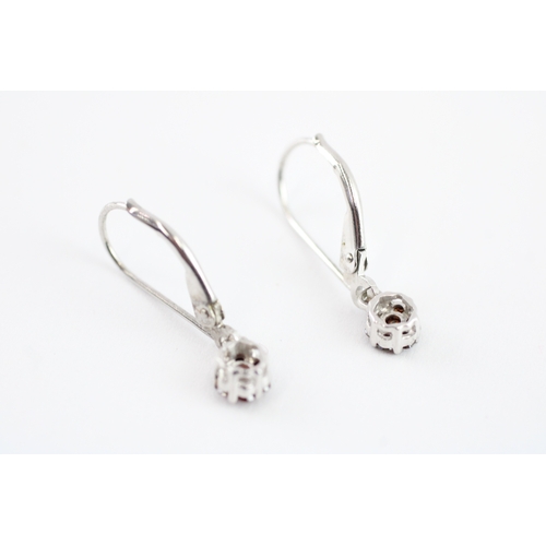 92 - 9ct gold enhanced red diamond drop earrings (1g)