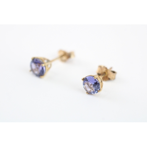 94 - 9ct gold tanzanite stud earrings (1.3g)